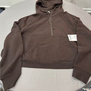 This is a Lululemon Scuba Oversized Half-Zip Hoodie in the color Java. New